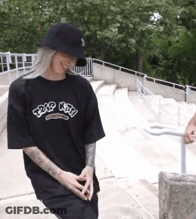 Woman In Black T-Shirt And Hat On Skateboard Ramp GIF