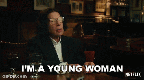 Woman In Black T-Shirt And Hat On Skateboard Ramp GIF