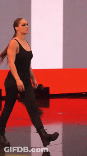 Woman In Black Tank Top And Pants Walking GIF