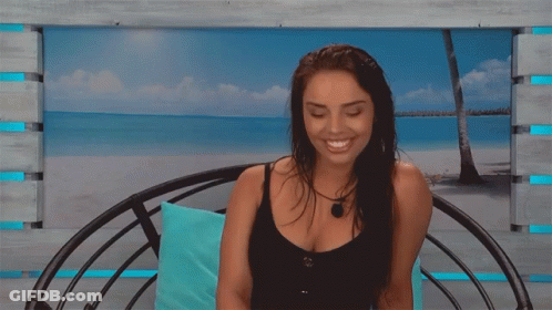 Woman In Black Tank Top At Beach GIF