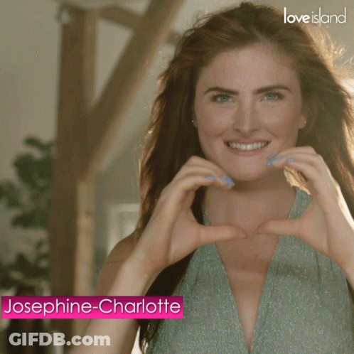 Woman In Black Tank Top At Beach GIF