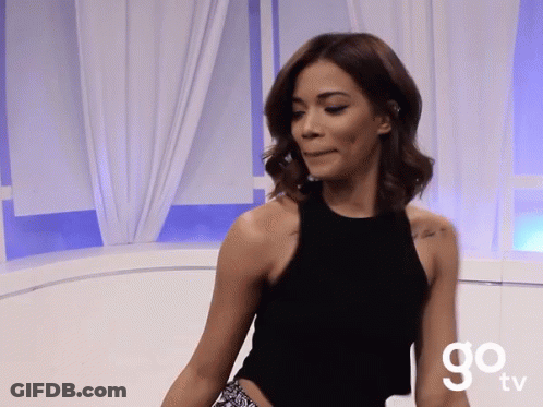 Woman In Black Tank Top At Go TV Sign GIF