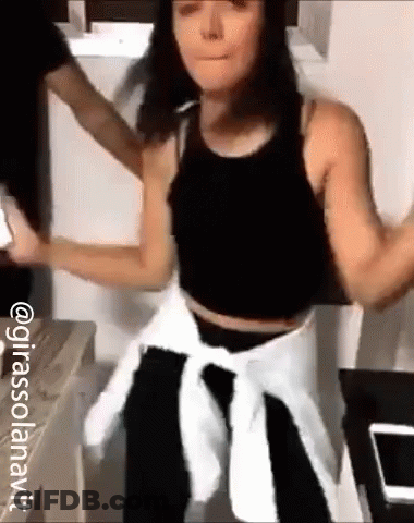 Woman In Black Tank Top Dancing With Man GIF
