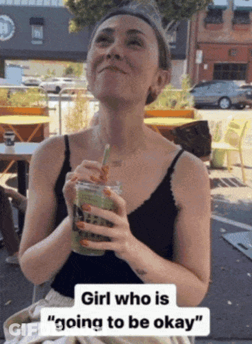 Woman In Black Tank Top Drinking Green Drink With Straw GIF