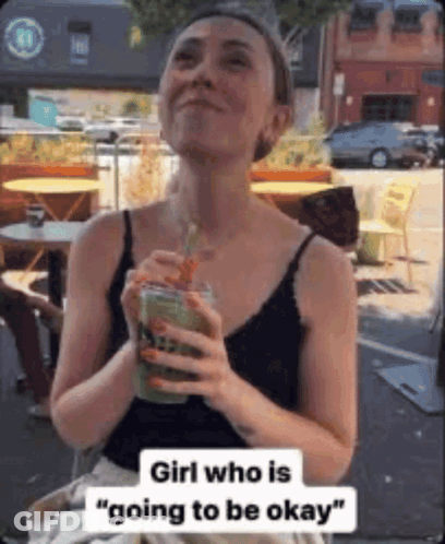 Woman In Black Tank Top Drinking Green Smoothie GIF