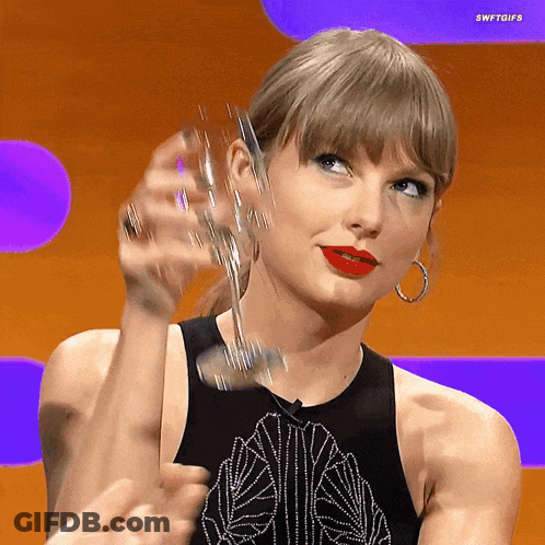 Woman In Black Tank Top Holding Wine GIF