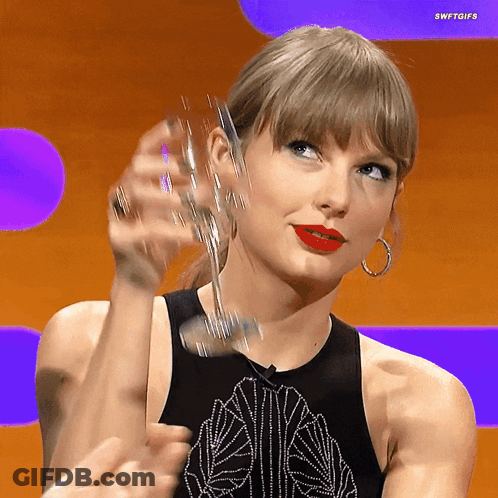 Woman In Black Tank Top Holding Wine GIF