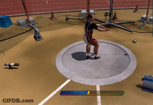 Woman In Black Tank Top Holds Pink Ball In Front Of Man GIF