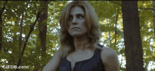 Woman In Black Tank Top In Forest GIF