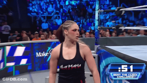 Woman In Black Tank Top In Wrestling Ring GIF
