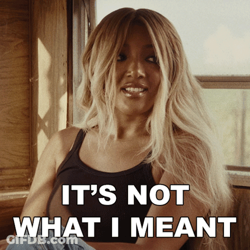 Woman In Black Tank Top Saying Not What I Meant GIF