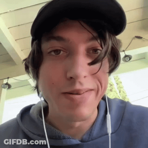 Woman In Black Tank Top Saying Psssh GIF