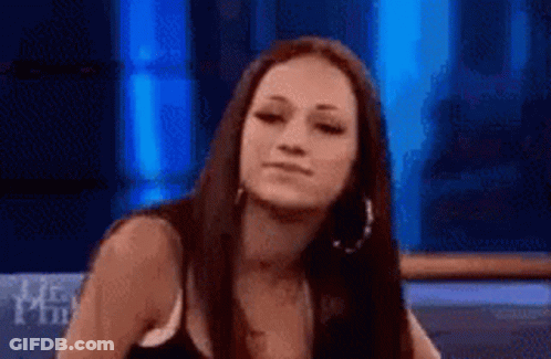 Woman In Black Tank Top Sitting GIF