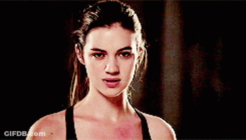Woman In Black Tank Top Smiling Funny Face GIF