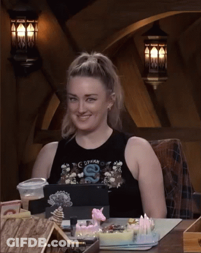Woman In Black Tank Top With Snake Smiling GIF
