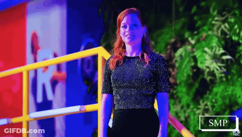 Woman In Black Top And Black Skirt By Railing GIF