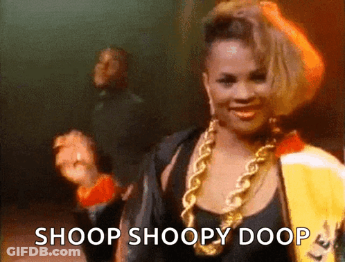 Woman In Black Top And Gold Chains Says Shoop Shoopy Doop GIF