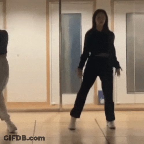 Woman In Black Top Dancing GIF