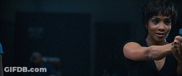 Woman In Black Top Holding Hands Up GIF