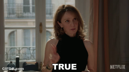 Woman In Black Top Says True In Front Of Window GIF