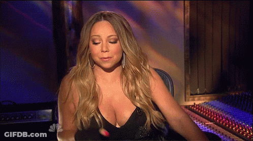 Woman In Black Top Sitting At Sound Board GIF