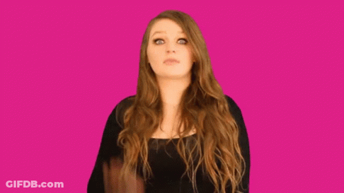 Woman In Black Top Waving And Making Funny Face GIF