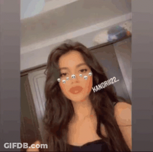 Woman In Black Top With Long Brown Hair And Filter GIF