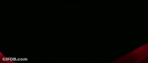Woman In Black Top With Red Cloth GIF