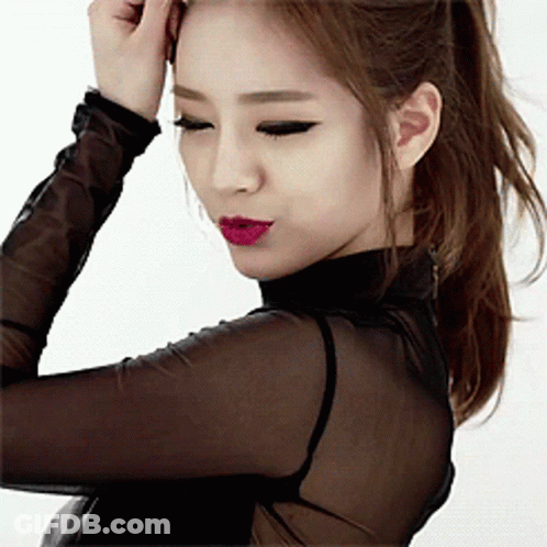 Woman In Black Turtleneck And Red Lipstick GIF