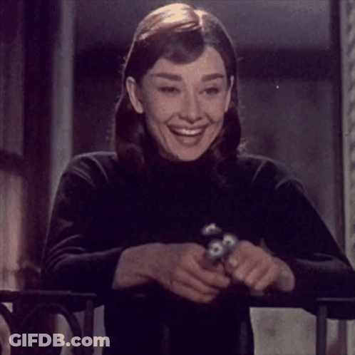 Woman In Black Turtleneck Smiling GIF