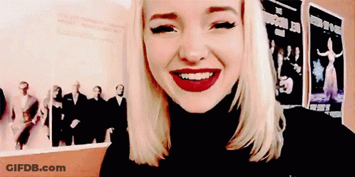 Woman In Black Turtleneck Smiling GIF