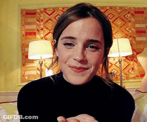 Woman In Black Turtleneck Smiling GIF