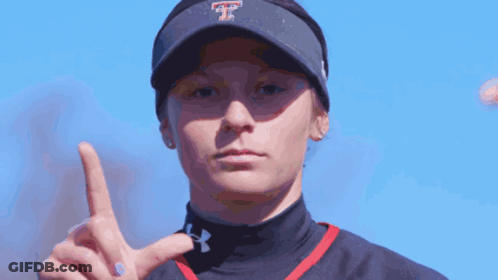 Woman In Black Under Armour Shirt Smiling GIF