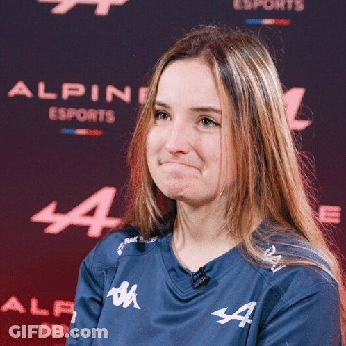 Woman In Blue Alpine Esports Shirt Making Face GIF