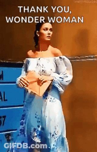 Woman In Blue And White Dress Saying Thank You Wonder Woman GIF