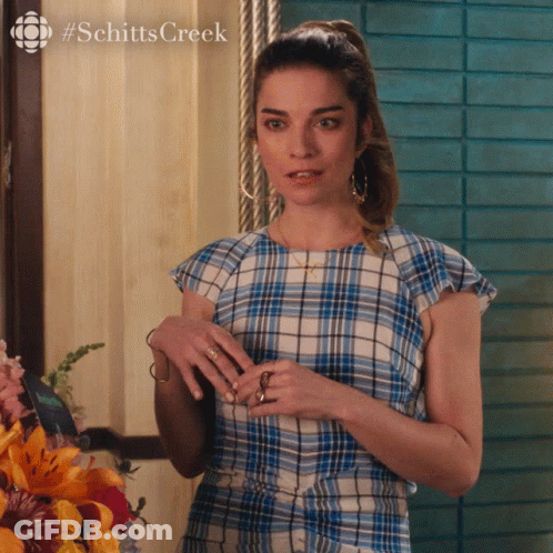 Woman In Blue And White Plaid Top Schitts Creek GIF