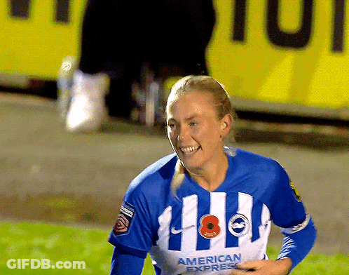 Woman In Blue And White Striped American Express Jersey Smiling GIF
