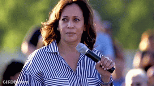 Woman In Blue And White Striped Shirt Holding Microphone GIF