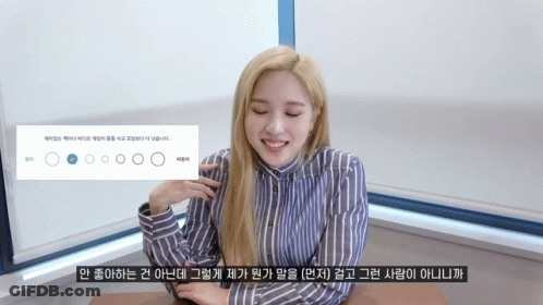 Woman In Blue And White Striped Shirt Smiling GIF