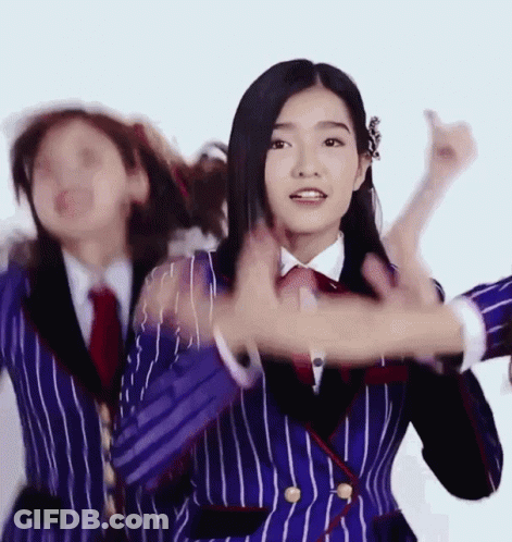 Woman In Blue And White Striped Suit Dancing GIF