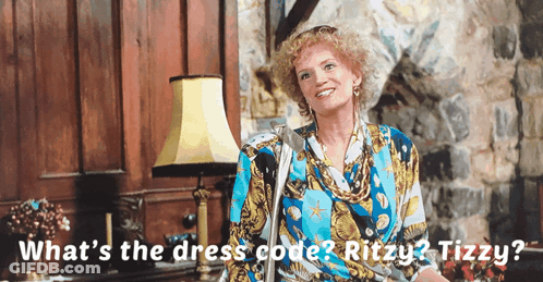 Woman In Blue And Yellow Dress Saying What's The Dress Code Ritzy Tizzy GIF
