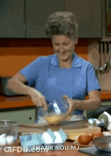 Woman In Blue Apron Mixing Eggs Saying Thank You Mj GIF