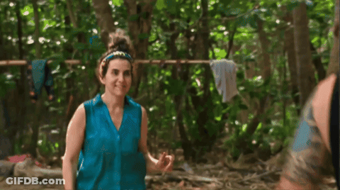 Woman In Blue Beside Man In Black GIF