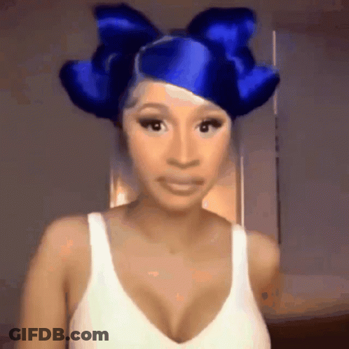 Woman In Blue Bow And White Tank Top GIF