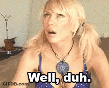 Woman In Blue Bra And Necklace On Couch GIF