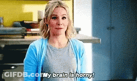 Woman In Blue Cardigan Saying Brain Is Horny GIF
