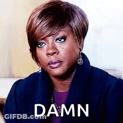 Woman In Blue Coat Making Funny Face Saying Damn GIF