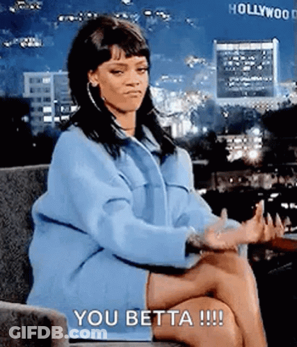 Woman In Blue Coat Sitting Cross-Legged Saying You Betta GIF