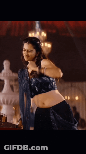 Woman In Blue Crop Top Dancing GIF