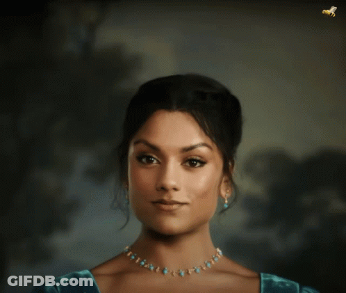 Woman In Blue Dress And Turquoise Necklace GIF
